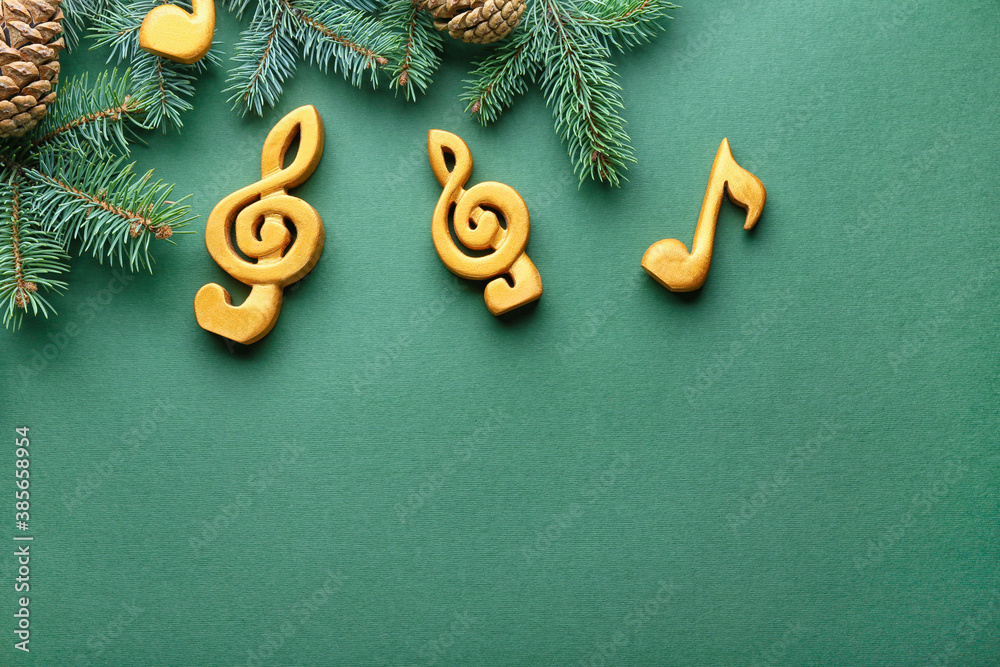 Note signs and Christmas tree branch on color background