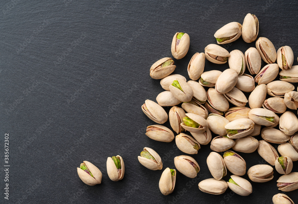 Pistachios on a black background