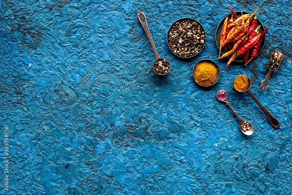 Red hot pepper and paprika - cooking utensils and spices, top view