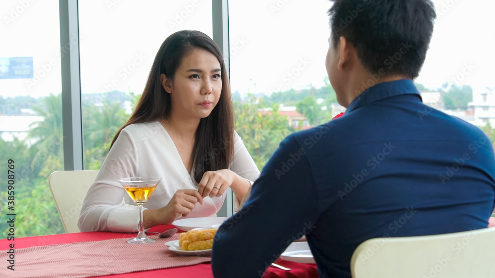 Happy romantic couple eating lunch at restaurant . Couple anniversary celebration and lifestyle .