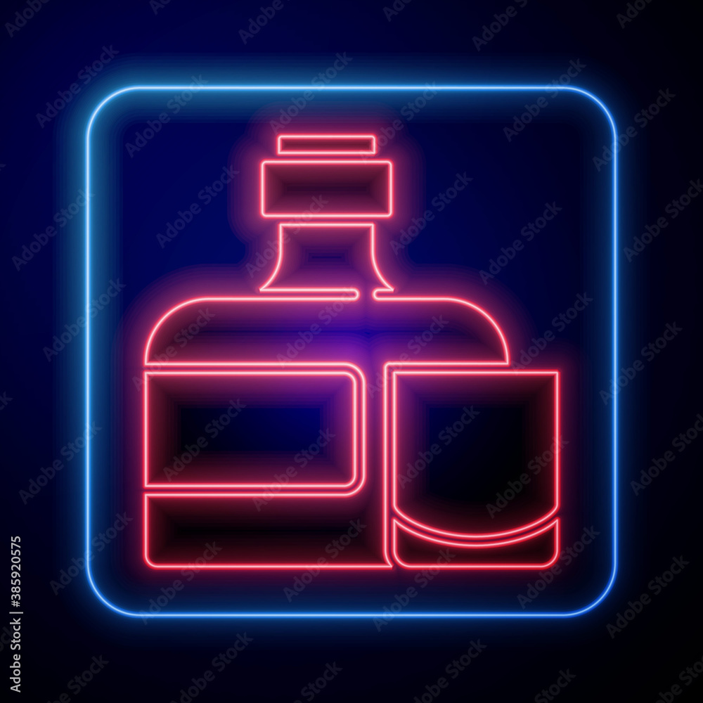 Glowing neon Whiskey bottle and glass icon isolated on blue background. Vector.