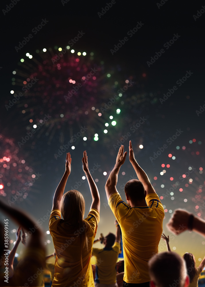 Fans celebrate in Stadium Arena night fireworks