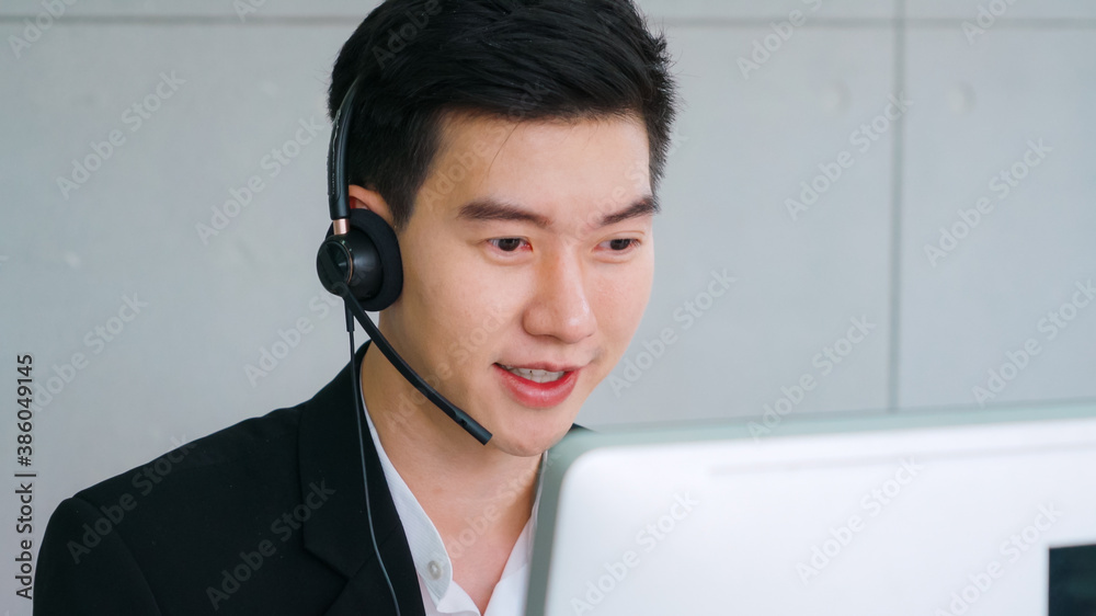 Business people wearing headset working in office to support remote customer or colleague. Call cent