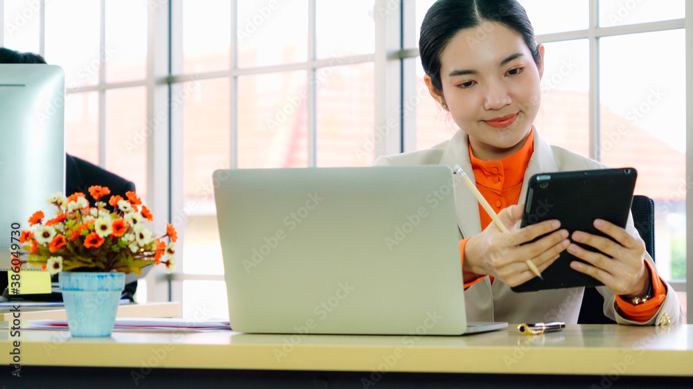 Business people working at table in modern office room while analyzing financial data report .