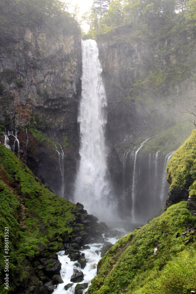 waterfall in the mountains in the forest