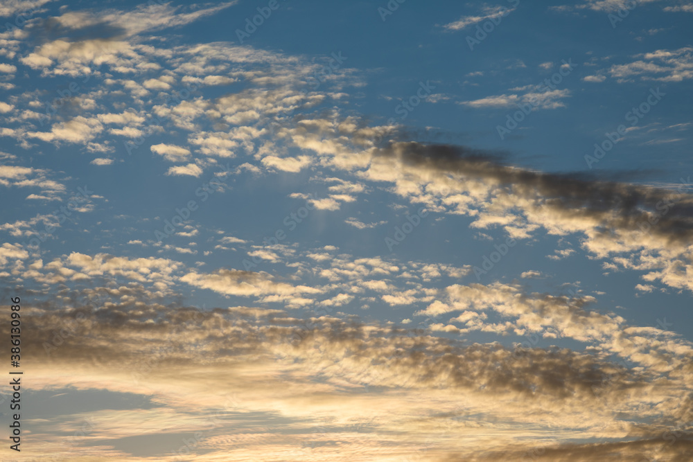 sunset yellow and blue sky with clouds