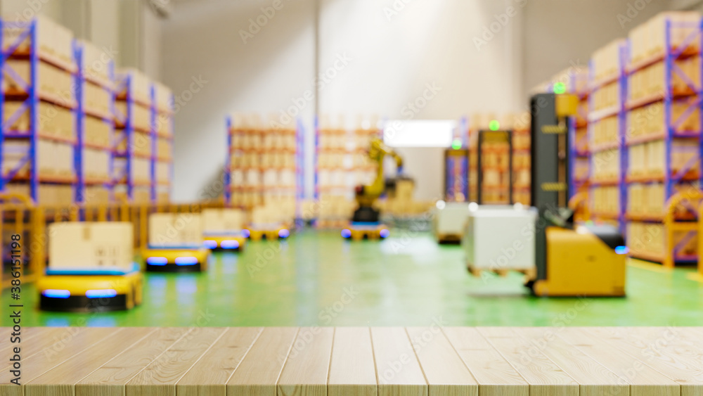 Empty wood table top on blurred factory background(Automated guided vehicle) AGV.