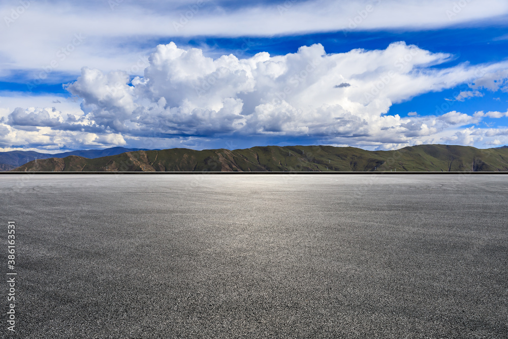 Race track and mountain with sky cloud natural scenery.