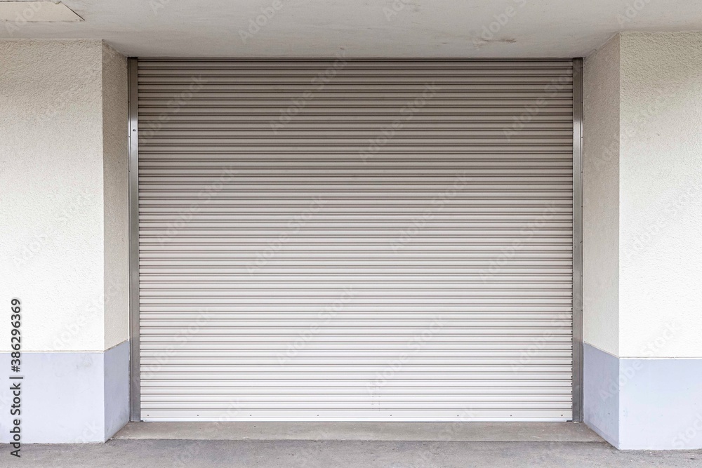 A white shutter door close at an industrial warehouse