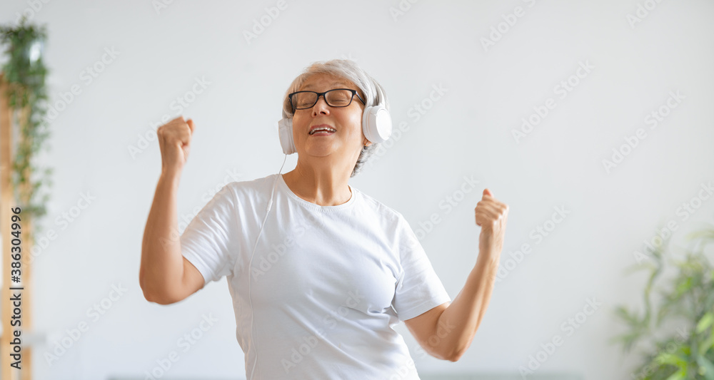 senior woman listening to music