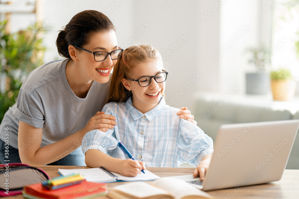 Girl doing homework or online education.