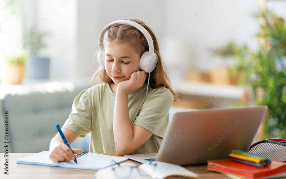 Girl doing homework or online education.