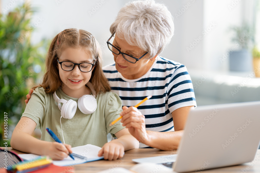 Girl doing homework or online education.