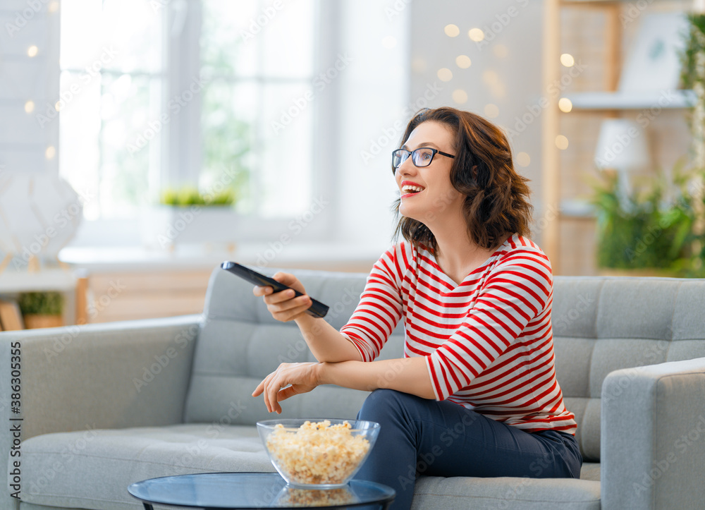 Young woman watching  TV