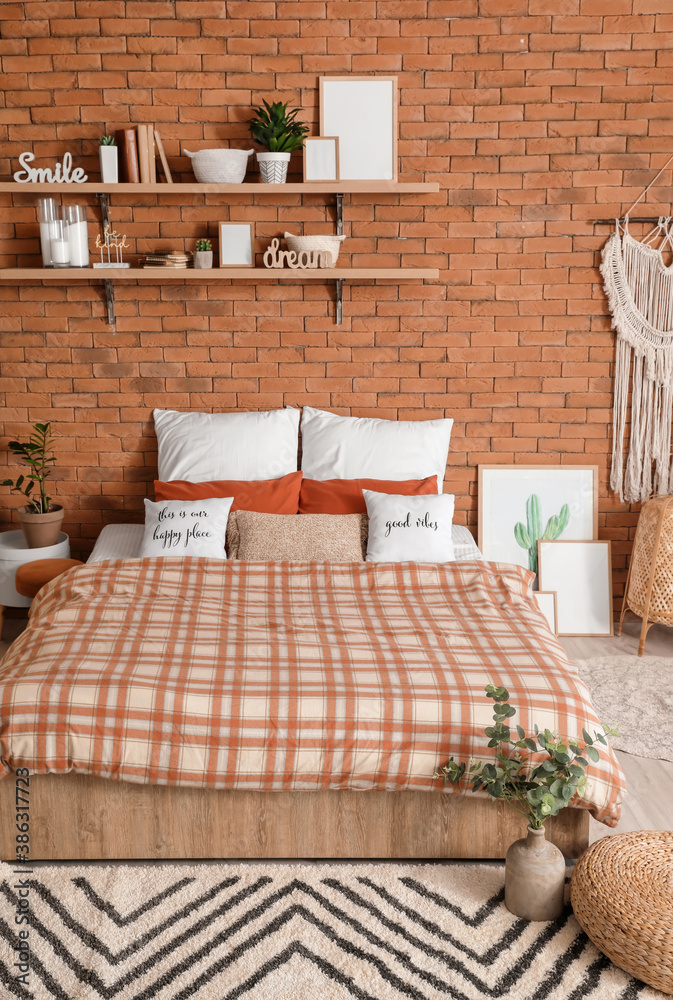 Interior of modern stylish bedroom with shelves