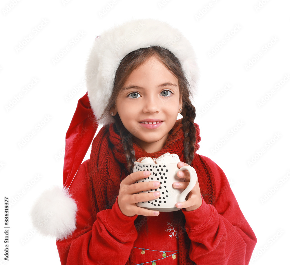 Cute little girl in Santa Claus hat and with cup of hot chocolate on white background