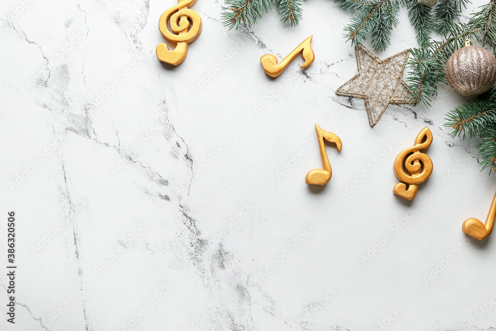 Note signs and Christmas decor on light background