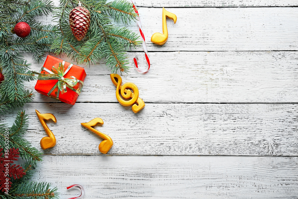 Note signs and Christmas decor on wooden background