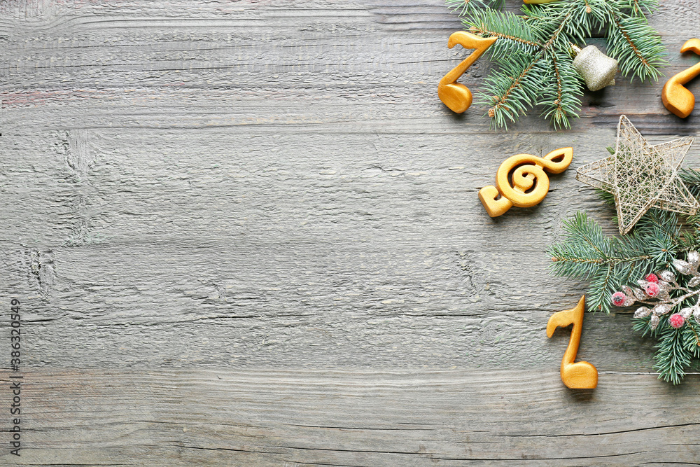 Note signs and Christmas decor on wooden background