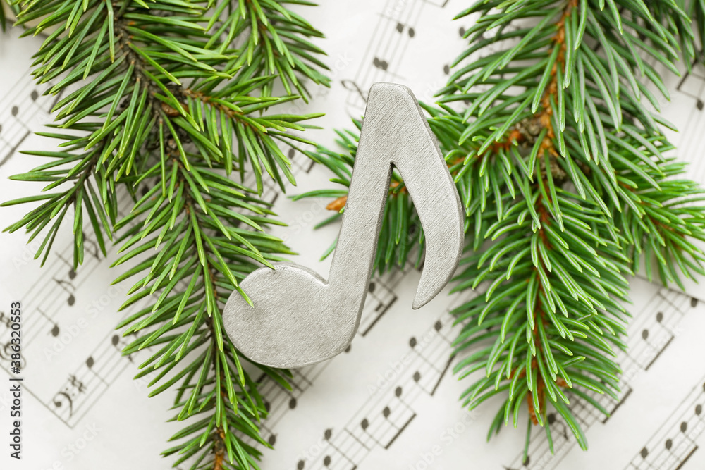 Note sheets and Christmas decor on table, closeup