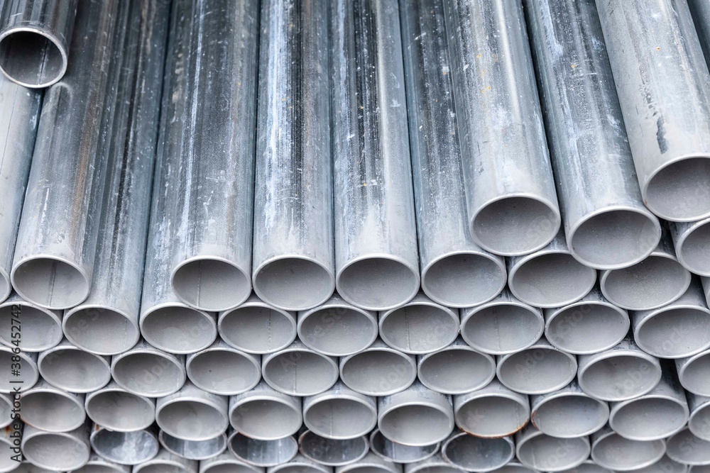 Close - up Stack of construction metal pipes