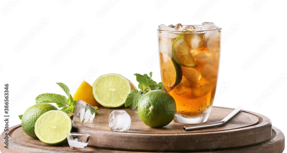 Glass of tasty Cuba Libre cocktail on table against white background