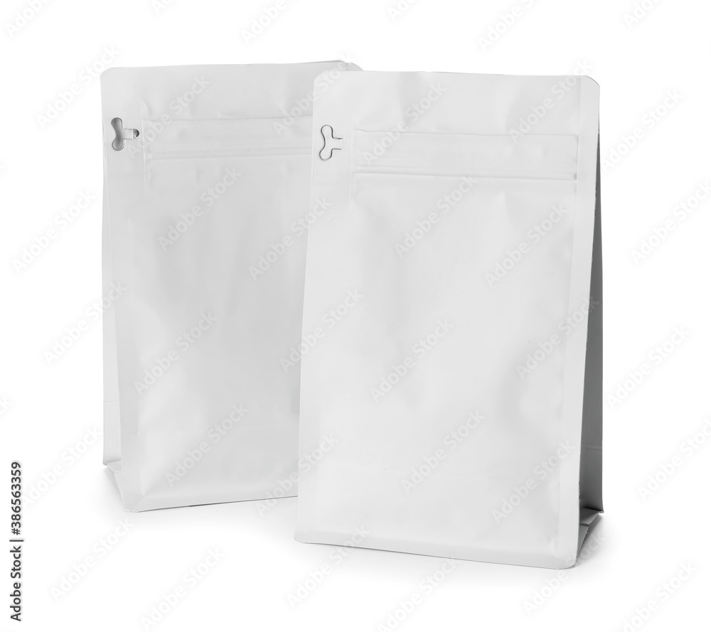 Blank coffee bags on white background