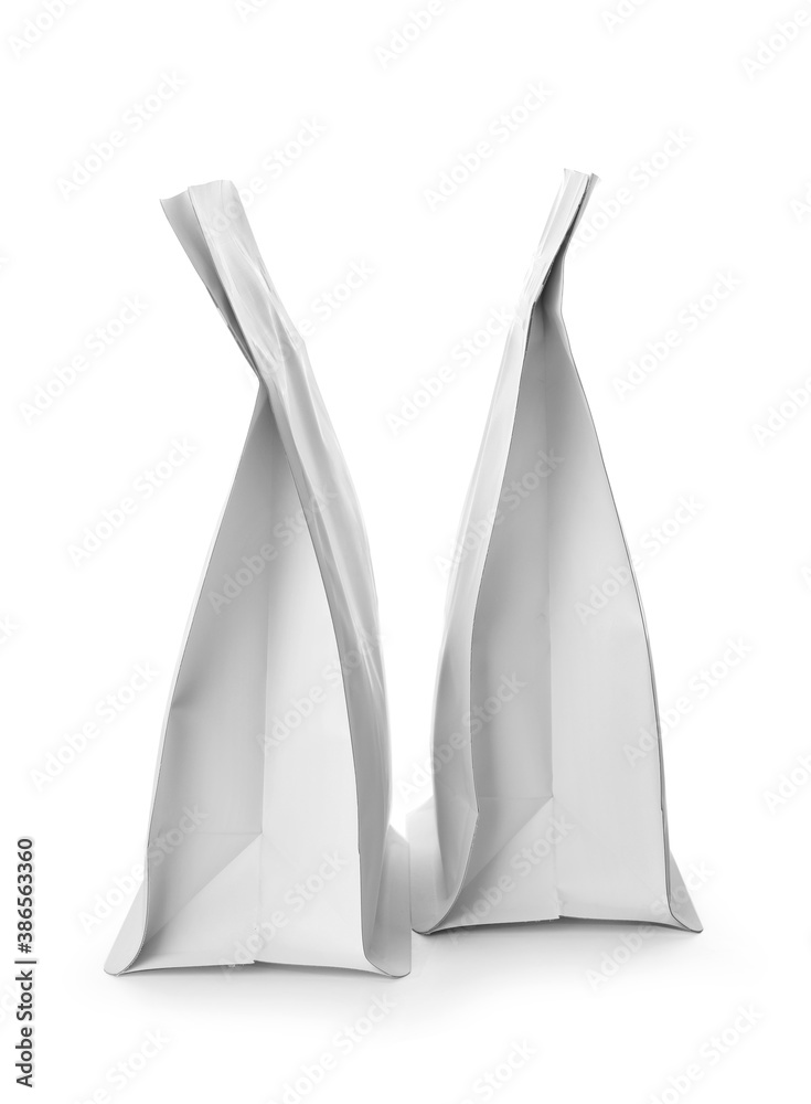 Blank coffee bags on white background