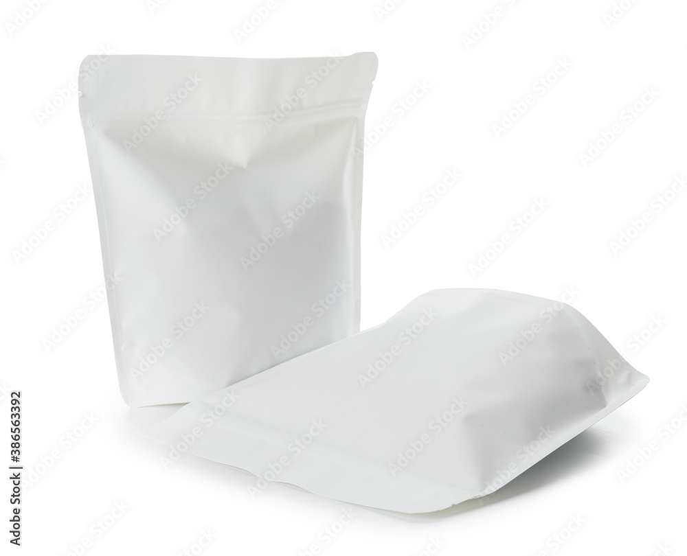 Blank coffee bags on white background