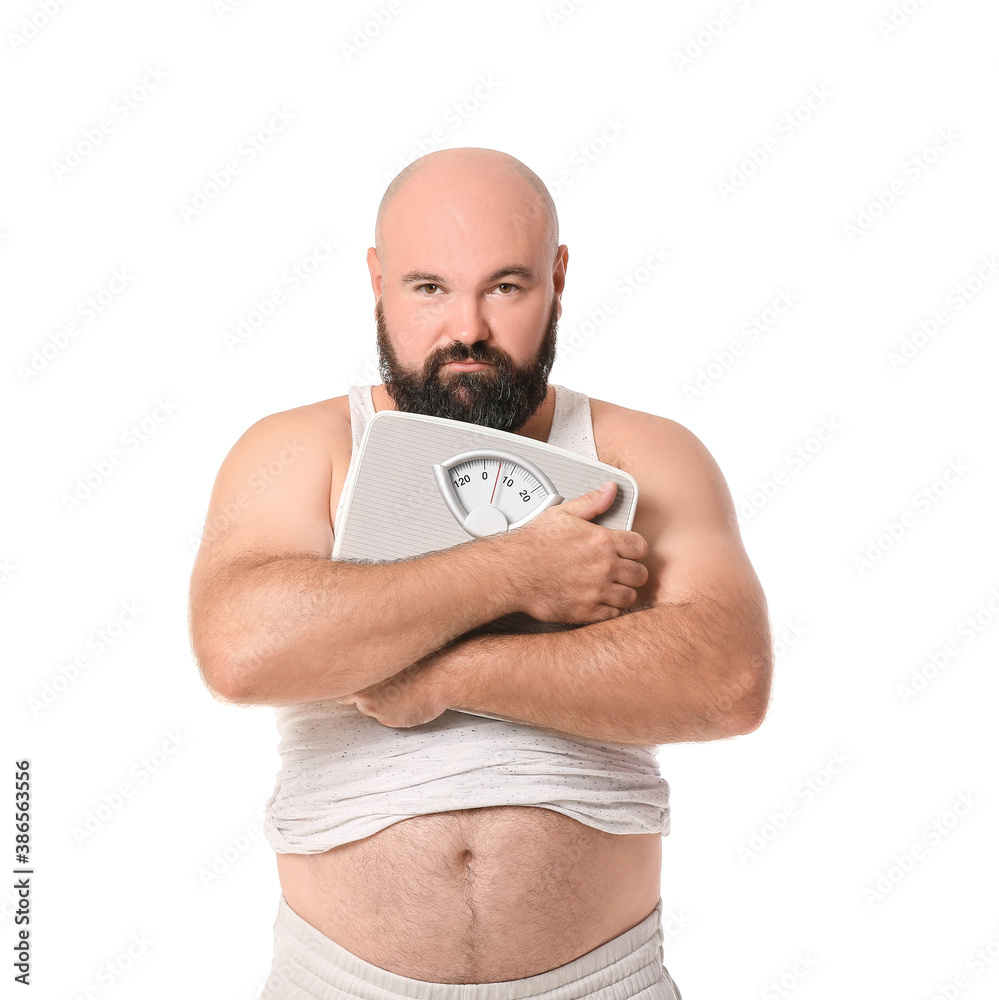 Overweight man with scales on white background. Weight loss concept