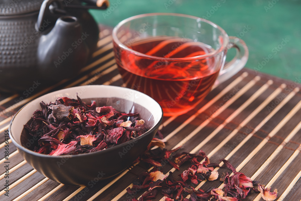 Composition with hibiscus tea on table