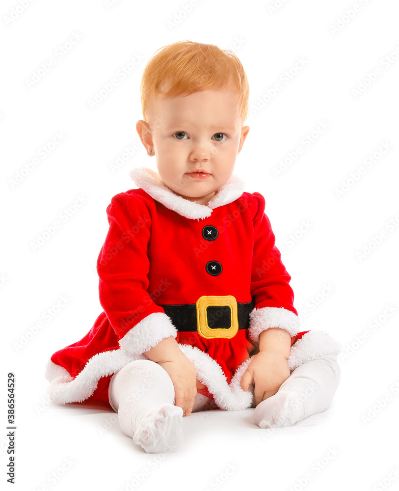 Cute little baby in Christmas costume on white background