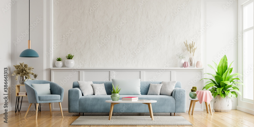 White plaster wall living room have sofa and armchair.