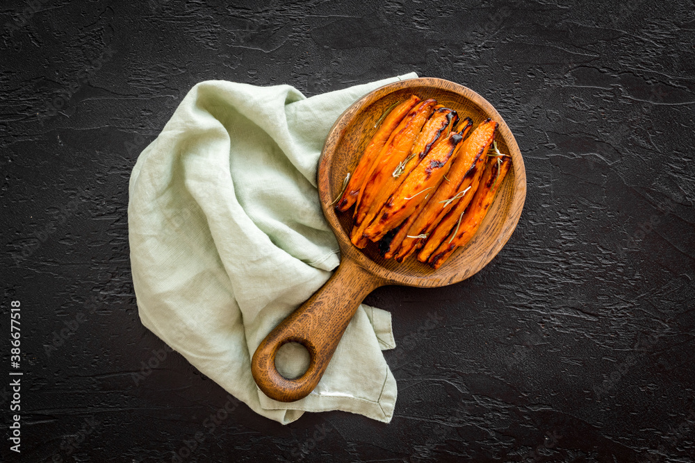 Homemade baked sweet potato - fries with spices, top view