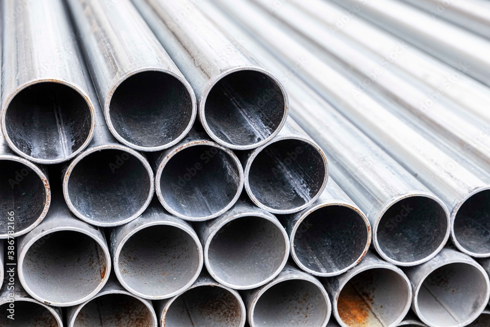 Close - up Stack of construction metal pipes