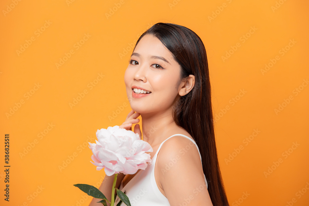 Pure Beauty. Girl holding pink Peony Flower