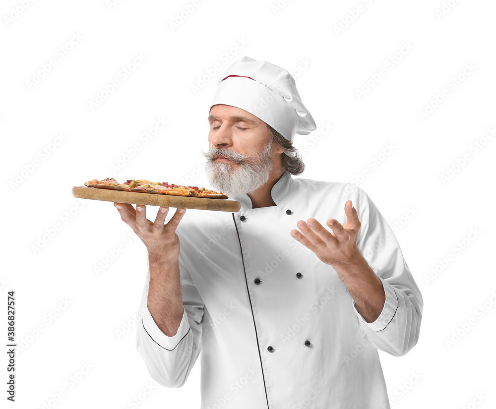 Mature male chef with tasty pizza on white background