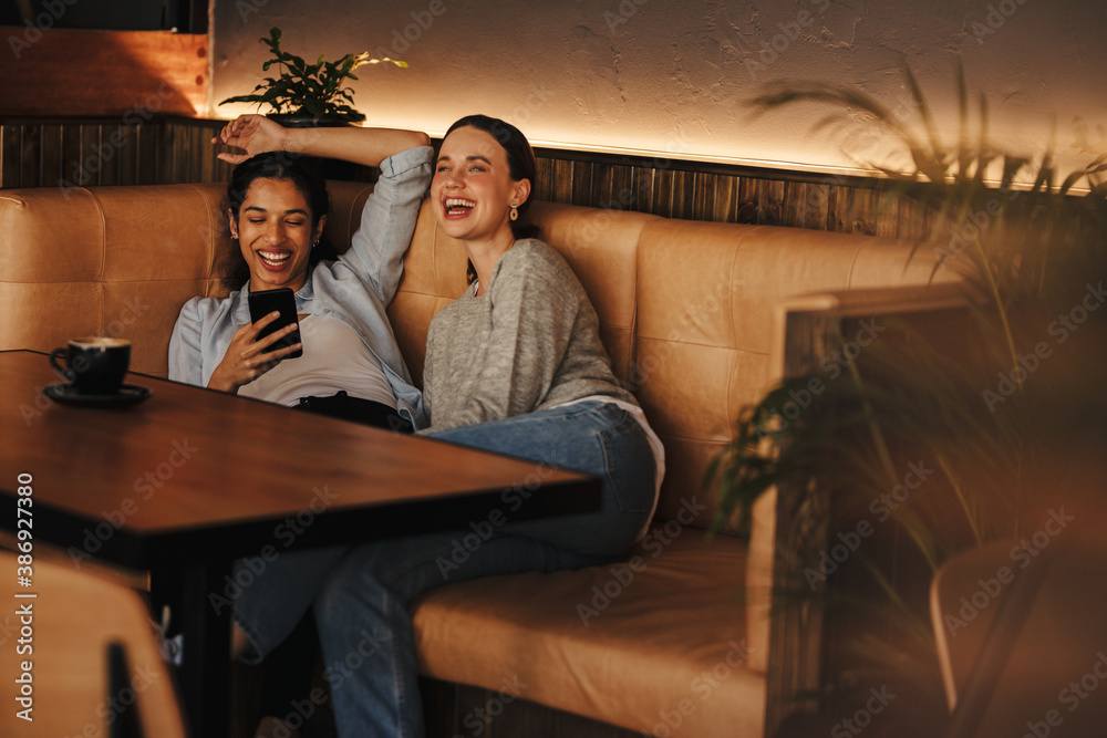 Women hanging out a coffee shop