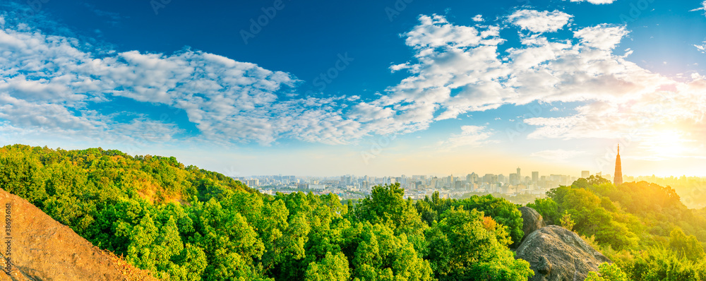 Ancient Baochu Pagoda.Chinese traditional architecture and modern city skyline in Hangzhou at sunris