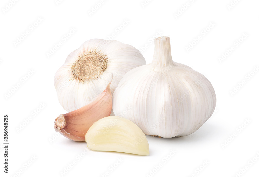 Peeled Garlic Cloves and Bulb isolated on white background.