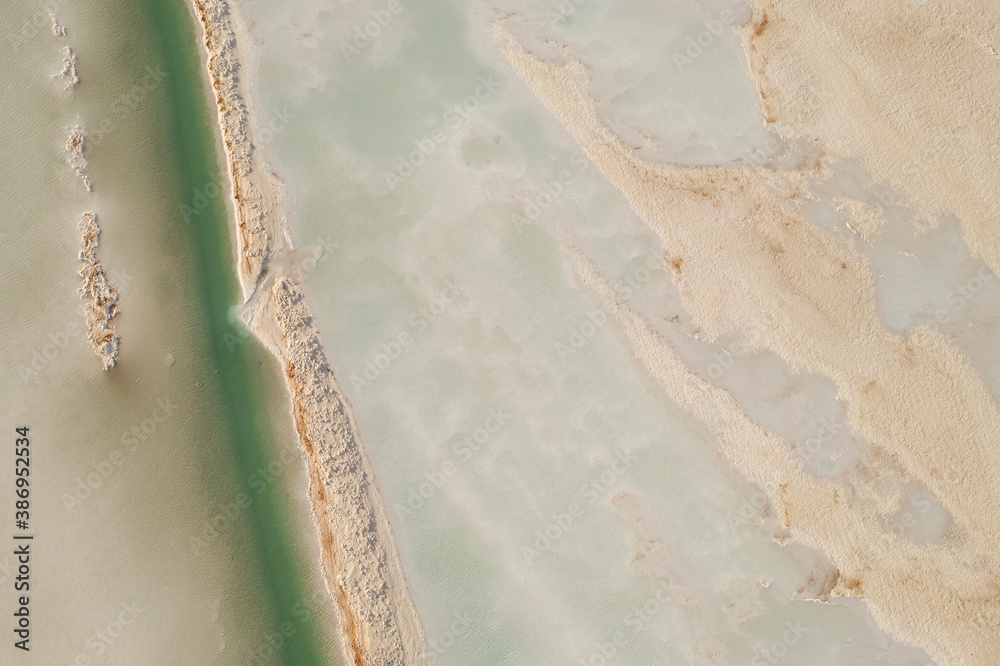 Salt lake with wide flatlands background.