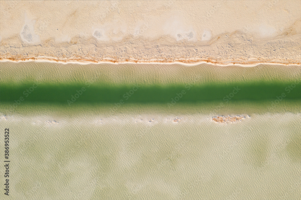 Salt lake with wide flatlands background.