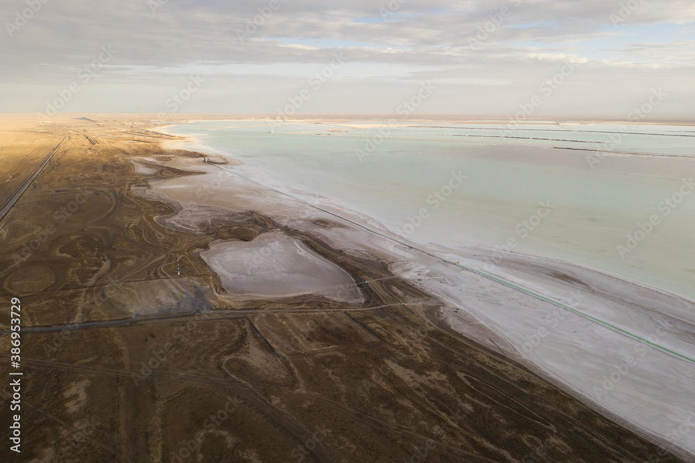 Salt lake with wide flatlands background.