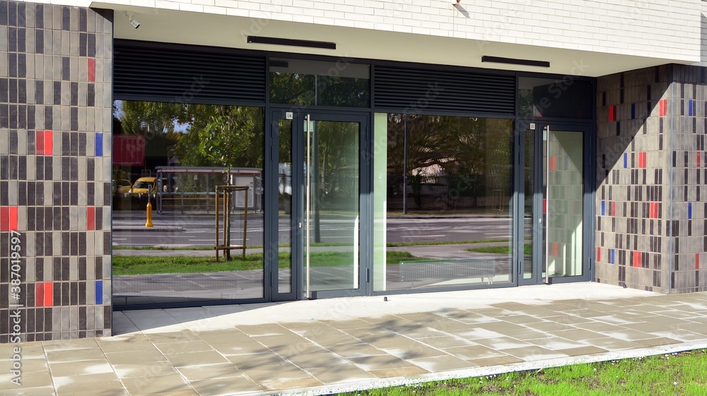 Panoramic windows of new commercial premises. Commercial property in development standard for rent.