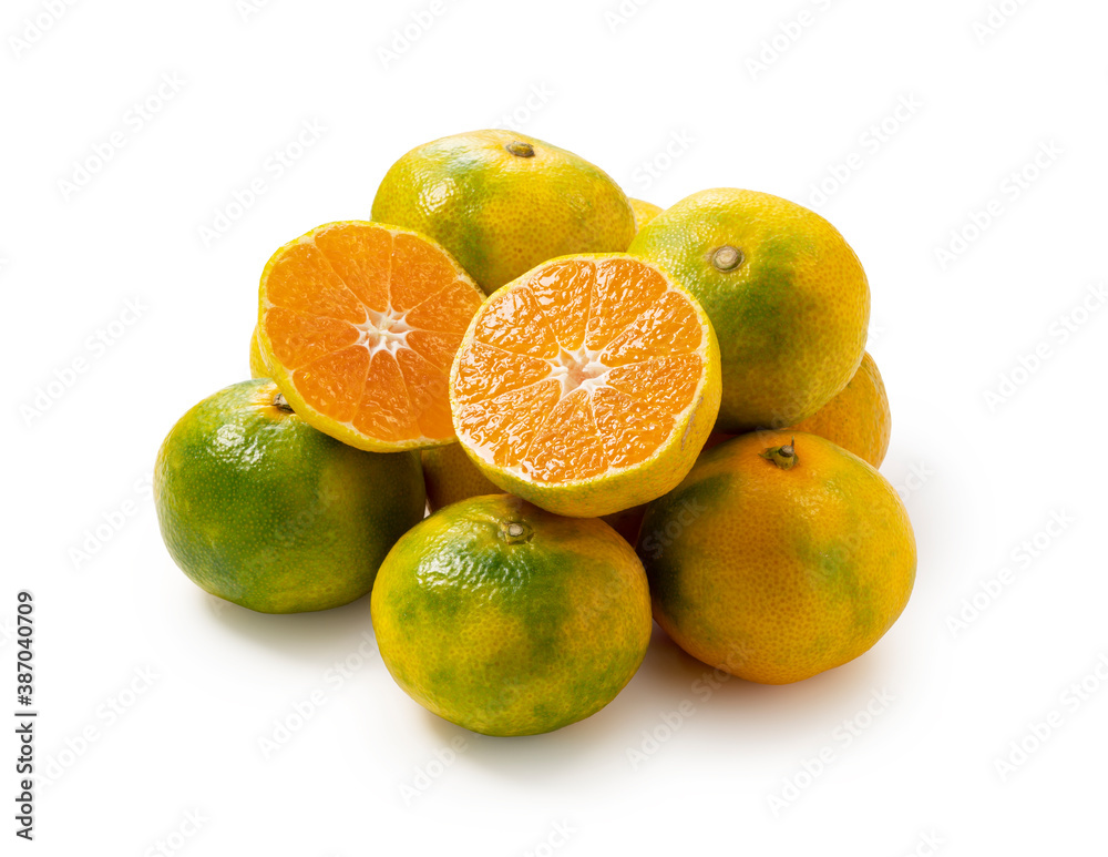 Early Japanese mandarin oranges on a white background