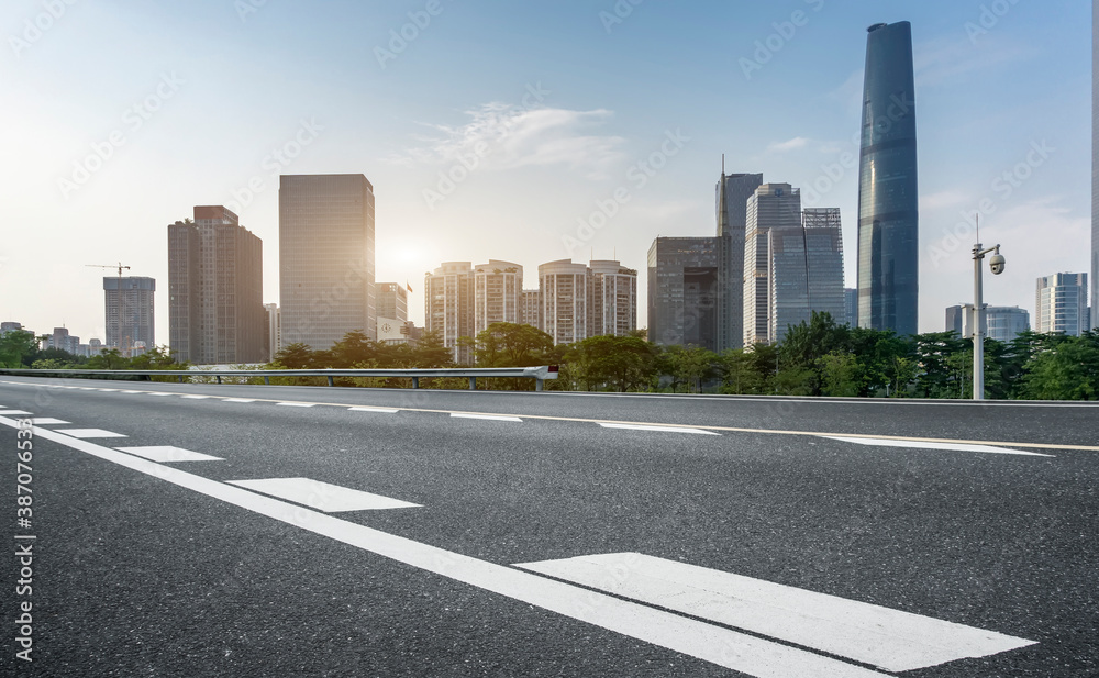 Road ground and modern architectural landscape skyline of Chinese city