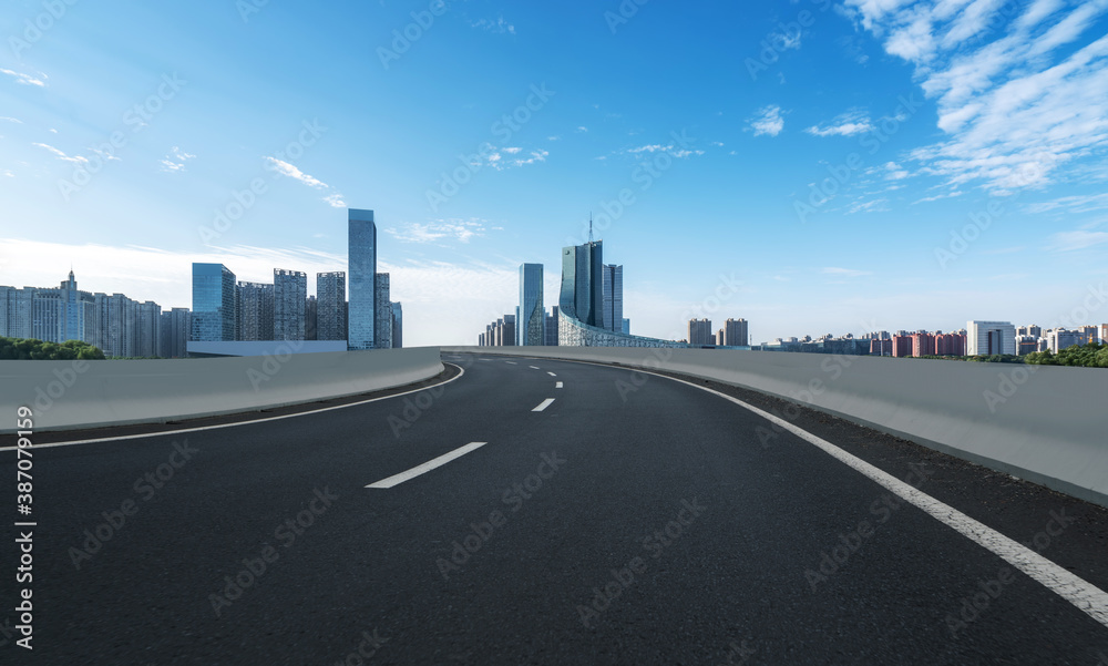 Road ground and modern architectural landscape skyline of Chinese city