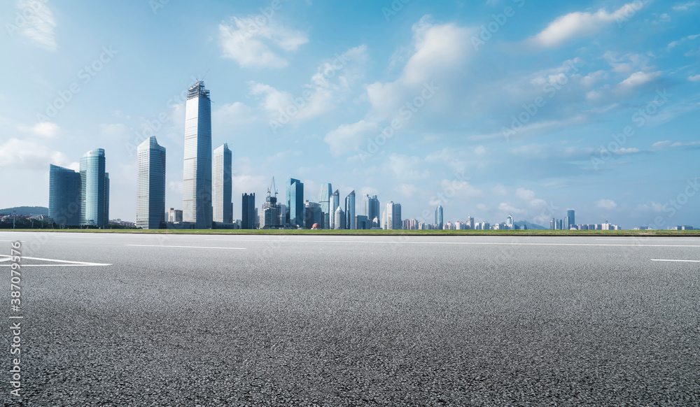 Road ground and modern architectural landscape skyline of Chinese city