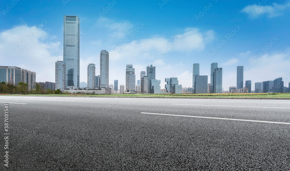 Road ground and modern architectural landscape skyline of Chinese city