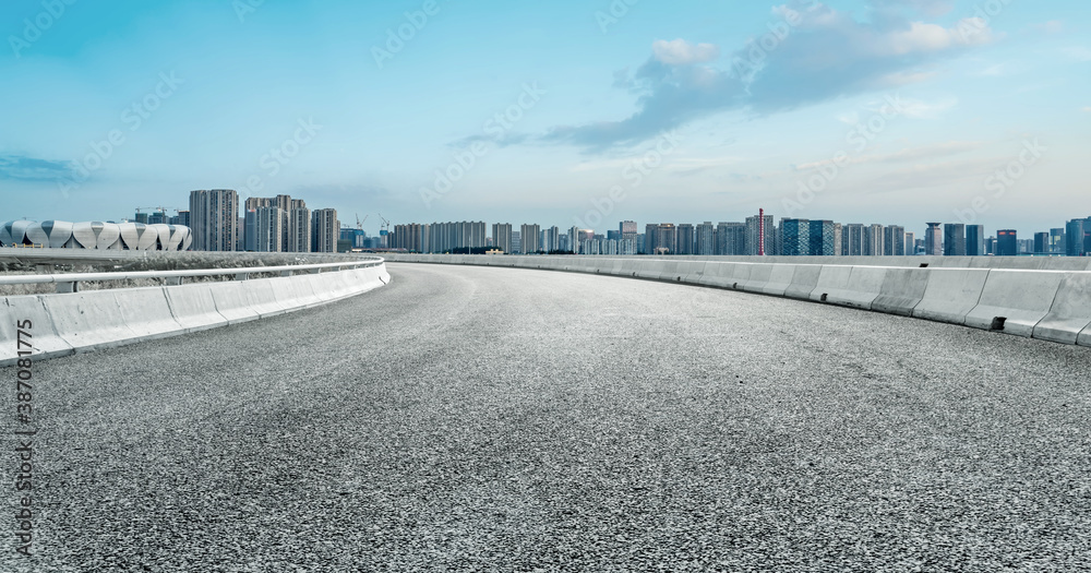 Road ground and modern architectural landscape skyline of Chinese city